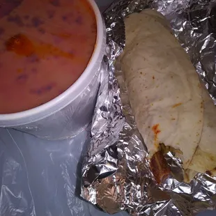 #1 with bacon and green chile on a homemade tortilla. And posole for later. I got a dozen of red and green tamales too. Soooo good.