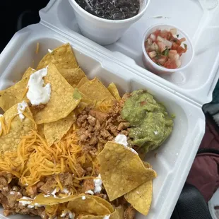 How they served the nacho platter . This is the worst &quot;loaded&quot; nachos. Extremely sloppy, barely any sour cream . Chicken was like dog food.