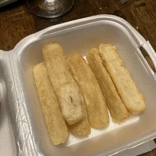 Yuca fries served with cilantro sauce