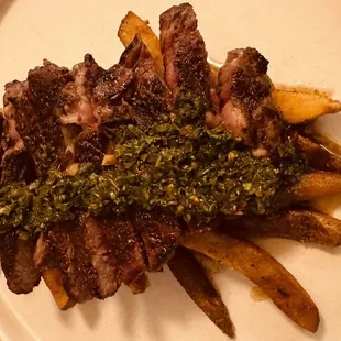a plate of food on a wooden table