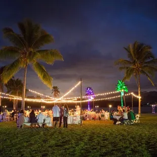 Amazing job creating a beautiful ambiance with a mixture of cafe lights and uplighting.