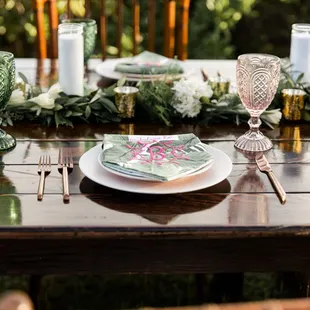 It was just like Pinterest. Farm table, chairs w/chair pads, rose gold silverware, rose plates &amp; glassware rented from Accel.