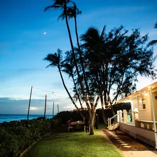 Accel delivery guys strung cafe lights from rented bamboo poles over to the house. They installed it all &amp; made sure there was electricity.
