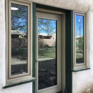 The new door and new 2 windows (with interior screens)