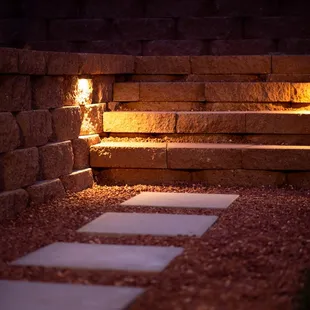 steps leading up to a stone wall
