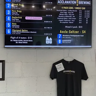 a t - shirt hanging on a wall