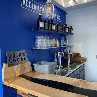 a bar with bottles of alcohol