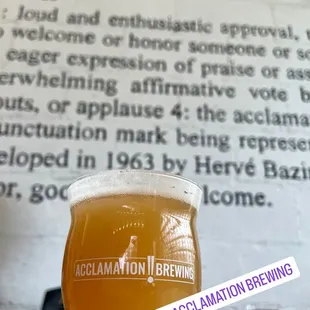 a glass of beer on a table