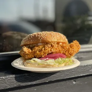 a fried chicken sandwich on a plate