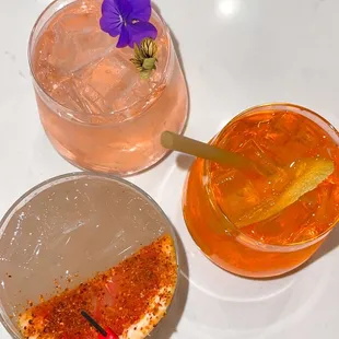 a glass of orange juice and a glass of orange juice