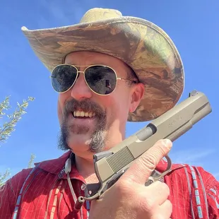 My classic 1911 that Accurate Arms did a stellar job of applying Cerakote to. Excellent job done by this fella.