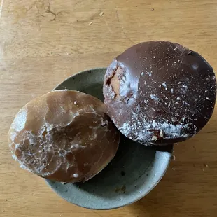 Left raspberry jelly and right cream filled donut