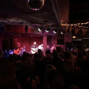 a band playing on stage