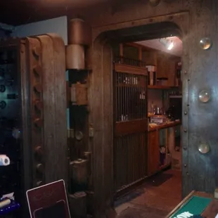 Behind the bar is a century old vault!