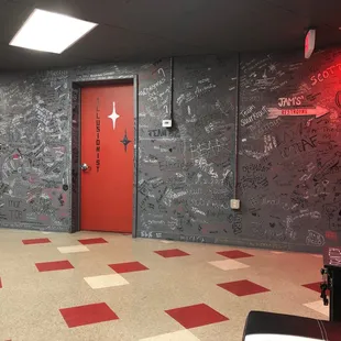 In the waiting room, illusionist room escape room door.