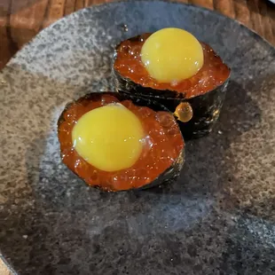 Ikura nigiri with quail egg