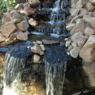 a waterfall in a garden