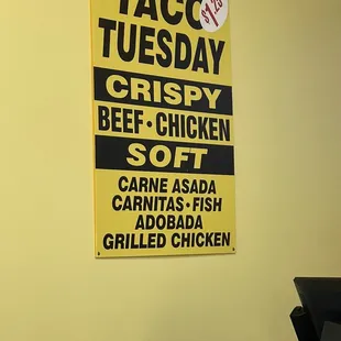 a taco tuesday sign on a wall