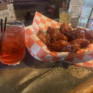 BBQ wings and my wife&apos;s vodka and cranberry