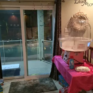 cotton candy machine and table they provided. Comes with all supplies to make 80 cotton candy's :)