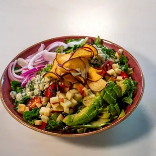 Apple Pecan Salad (V): Chopped Lettuce Mix + Avocado + Red Onion + Tomato + Crumbled Bleu Cheese + Apples + Pecans + Apple Cider Vinaigrette