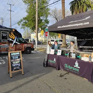 a street vendor selling wine