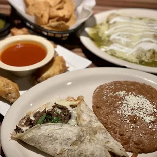 a plate of mexican food on a table