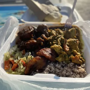 curry, brown stew chicken combo with a chicken patty