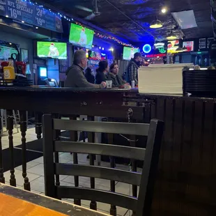 people sitting at the bar