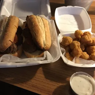 a sandwich and tater tots