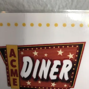 a close up of a diner sign