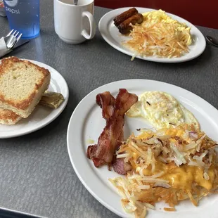 One egg breakfast with hashbrowns and biscuits!