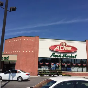 a car parked in front of the store