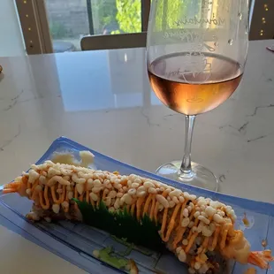 Shrimp tempura sushi ($8.95) with a glass of Rose (by Bucket List for $8 a bottle). Both from ACME