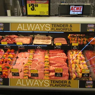 a display of meat and vegetables