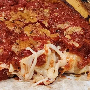 Cheese close up in a deep dish.