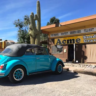 Acme’s storefront and classic bug.