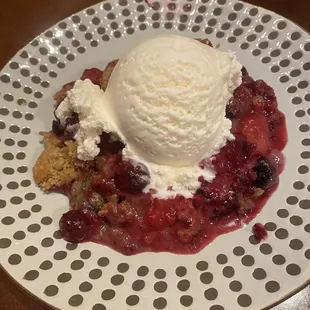 Berry cobbler with vanilla ice cream