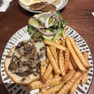 Mushroom Swiss burger with fries