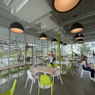 a restaurant with tables and chairs