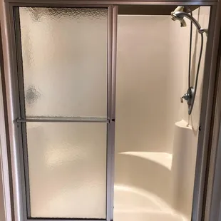 Does your shower look like this and you want an update.  Call us now!