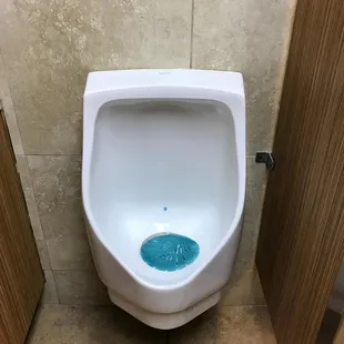 This is a waterless urinal.  Waterless urinals actually don't smell.