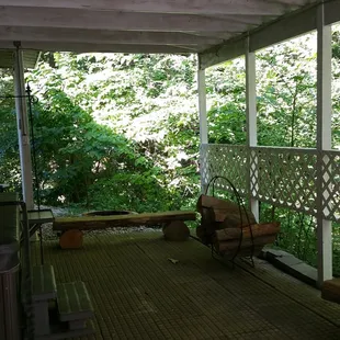 The North Porch is a great place to enjoy the outdoors, cookout, have a fire, or use the hot tub.