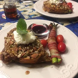 Delicious French toast with nuts and brown sugar. Asparagus wrapped in bacon.