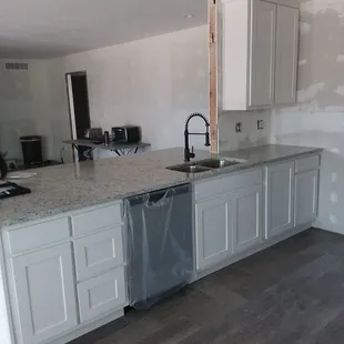 Kitchen cabinets made by Acosta shutters call us for your quote for any remodel on cabinets.