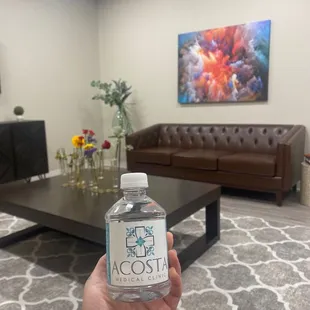 Offered me cold water with their logo! Beautiful waiting room.
