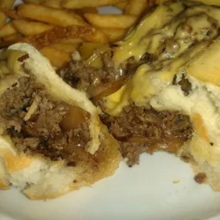 a plate with a sandwich and fries