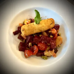 Roasted red beets, orange, pistachios, tomato confit and fried goat cheese!