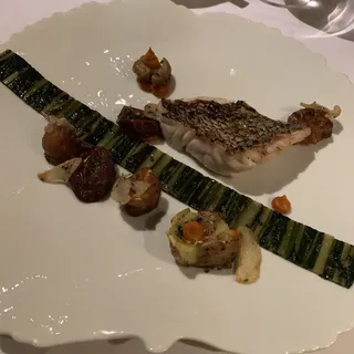 Black bass, grilled dandelion, marble potato, 'pesto rosso'