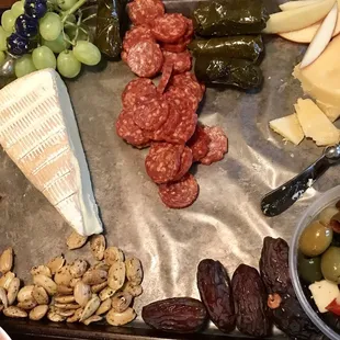 A closeup of the spread we made from everything we got at the store! We love sampling the cheeses !